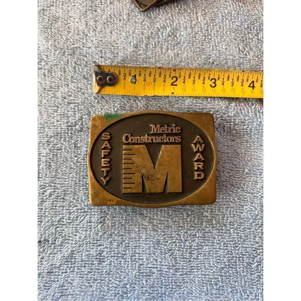 Vintage Metric Constructors Belt Buckle